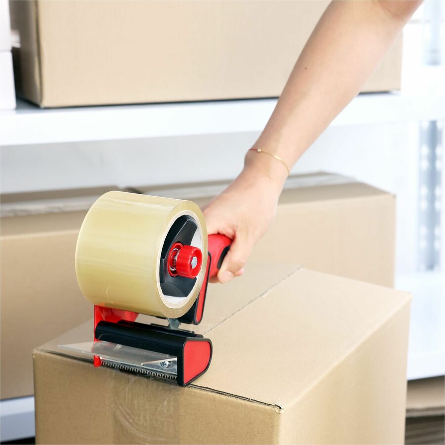 Sparco 3" Packaging Tape Dispenser, 1/EA (SPR68535), Red and Black Person using a tape dispenser to seal a cardboard box.